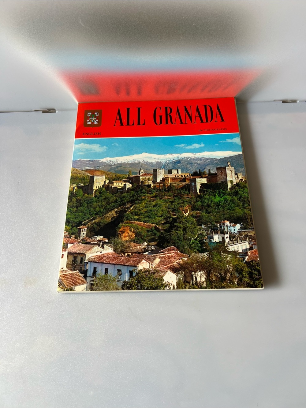 vintage travel guide book titled All Granada